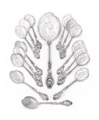 A SET OF FIFTEEN DUTCH SILVER OYSTER SPOONS AND A SERVING SPOON