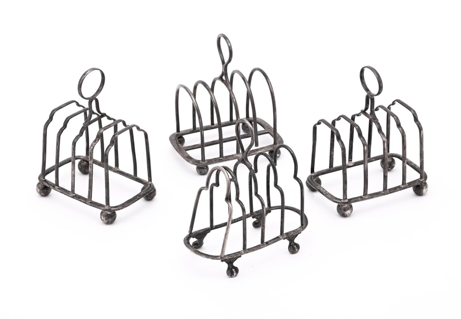 FOUR SILVER TOAST RACKS