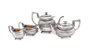 Y A GEORGE III SILVER FOUR PIECE OBLONG BALUSTER TEA SET
