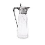 A GERMAN SILVER MOUNTED TAPERING GLASS DECANTER