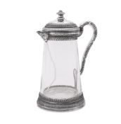 A LARGE SILVER MOUNTED SLIGHTLY TAPERING CLARET JUG