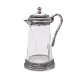 A LARGE SILVER MOUNTED SLIGHTLY TAPERING CLARET JUG