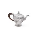 A GEORGE II SILVER INVERTED PEAR SHAPED TEAPOT