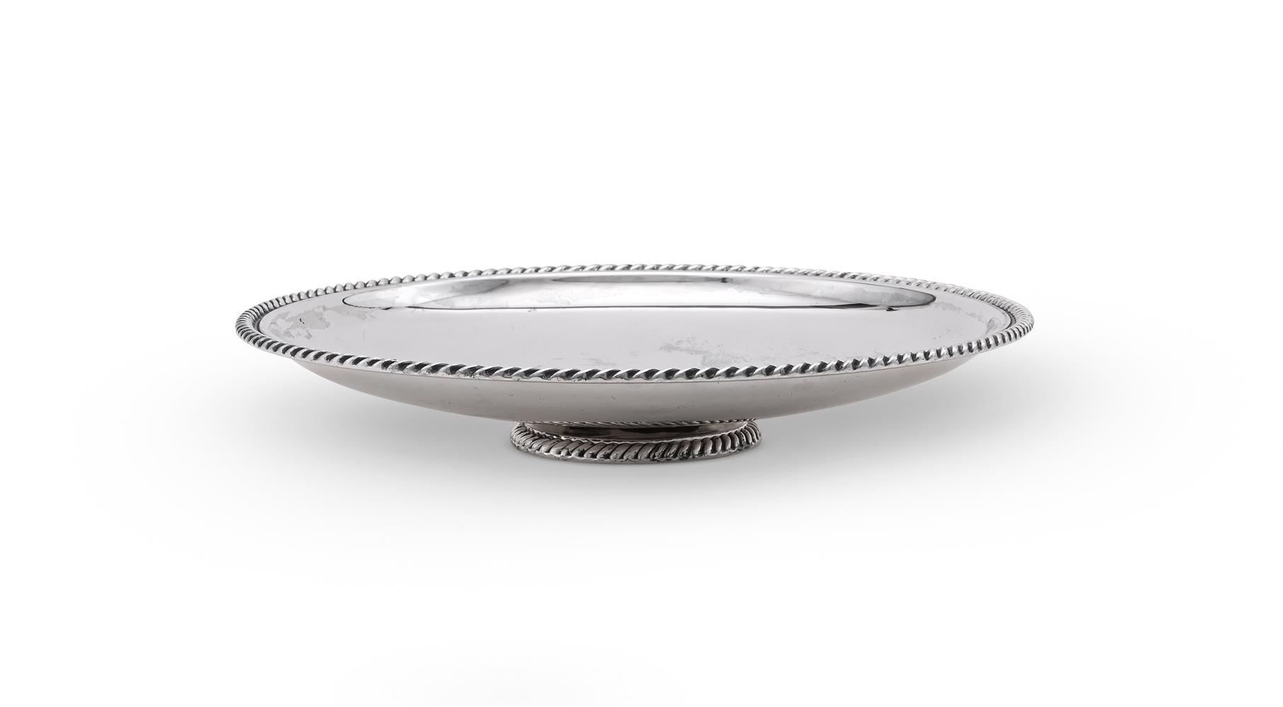 AN AMERICAN SILVER COLOURED PEDESTAL BOWL