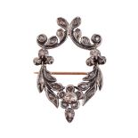 A DIAMOND FLORAL SWAG BROOCH