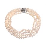 A FOUR ROW CULTURED PEARL AND DIAMOND NECKLACE