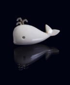A DIAMOND AND WHITE STONE WHALE BROOCH