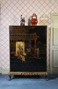 A BLACK LACQUER AND GILT CHINOISERIE DECORATED CUPBOARD OR WARDROBE, CIRCA 1930