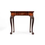 A GEORGE II 'RED WALNUT' FOLDING CARD TABLE, MID-18TH CENTURY