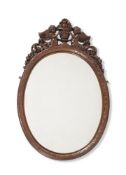 A CARVED OAK WALL MIRROR, IN 17TH CENTURY STYLE, 19TH CENTURY