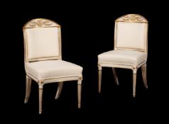 A PAIR OF SCANDINAVIAN CREAM PAINTED AND PARCEL GILT SIDE CHAIRS, LATE 18TH/EARLY 19TH CENTURY