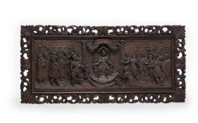 A CARVED OAK PANEL DEPICTING THE JUDGEMENT OF SOLOMON, LATE 17TH/EARLY 18TH CENTURY