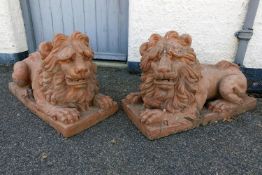 A PAIR OF TERRACOTTA LIONS, LATE 19TH/EARLY 20TH CENTURY