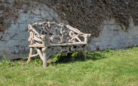 A ROOT WOOD 'GROTTO' GARDEN BENCH, 20TH CENTURY