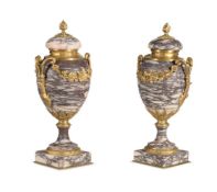 A PAIR OF FRENCH BRECHE VIOLETTE AND ORMOLU MOUNTED LIDDED URNS, 19TH CENTURY