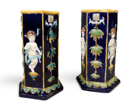 A PAIR OF MAJOLICA STICK STANDS, LATE 19TH CENTURY