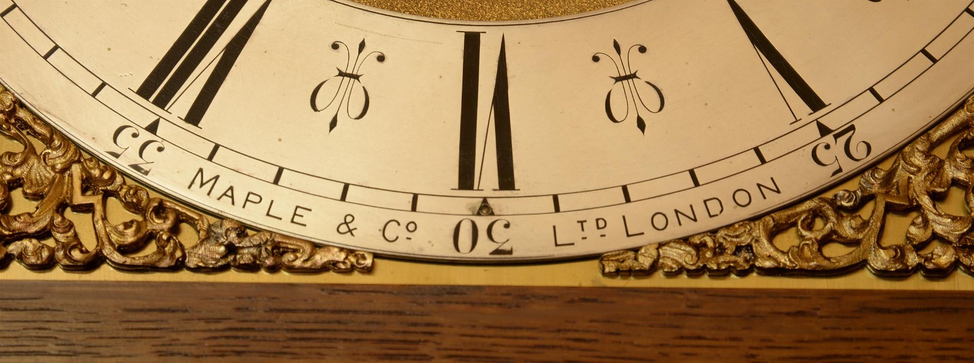 AN EDWARDIAN OAK QUARTER-CHIMING EIGHT-DAY LONGCASE CLOCK, RETAILED BY MAPLE & CO. - Image 3 of 3