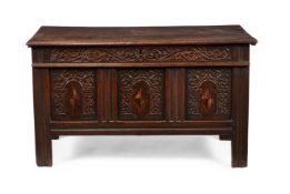 A CARVED OAK AND INLAID CHEST, MID 17TH CENTURY