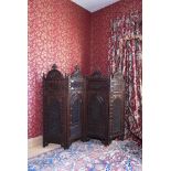 AN INDIAN CARVED HARDWOOD FOLDING ROOM SCREEN, LATE 19TH CENTURY