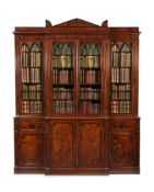 Y A REGENCY MAHOGANY AND EBONY INLAID BREAKFRONT LIBRARY BOOKCASE, CIRCA 1815