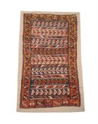 A KURDISH RUG, CIRCA 1825, approximately 200 x 105cm overall