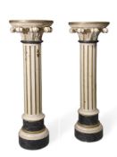 A PAIR OF ITALIAN CREAM PAINTED AND PARCEL GILT COLUMNS, IN NEOCLASSICAL TASTE, LATE 19TH CENTURY
