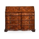 A WALNUT SERPENTINE FRONTED BUREAU, PROBABLY SOUTH GERMAN, SECOND HALF 18TH CENTURY