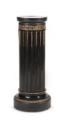 A VICTORIAN EBONISED AND GILT BRASS MOUNTED COLUMN, MID 19TH CENTURY