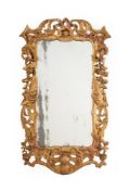 A GEORGE II CARVED GILTWOOD MIRROR, POSSIBLY IRISH, CIRCA 1750