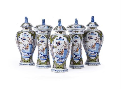 A DUTCH DELFT POLYCHROME GARNITURE OF FIVE VASES AND COVERS, LATE 17TH/18TH CENTURY