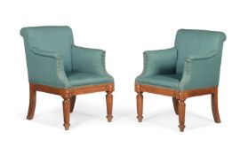 A PAIR OF EARLY VICTORIAN OAK LIBRARY ARMCHAIRS, IN THE MANNER OF A. W. N. PUGIN, MID 19TH CENTURY