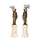 A RARE PAIR OF PARCEL GILT AND BRONZE FIGURAL TORCHERES, BY BARBEDIENNE AND GUILLEMIN, CIRCA 1870