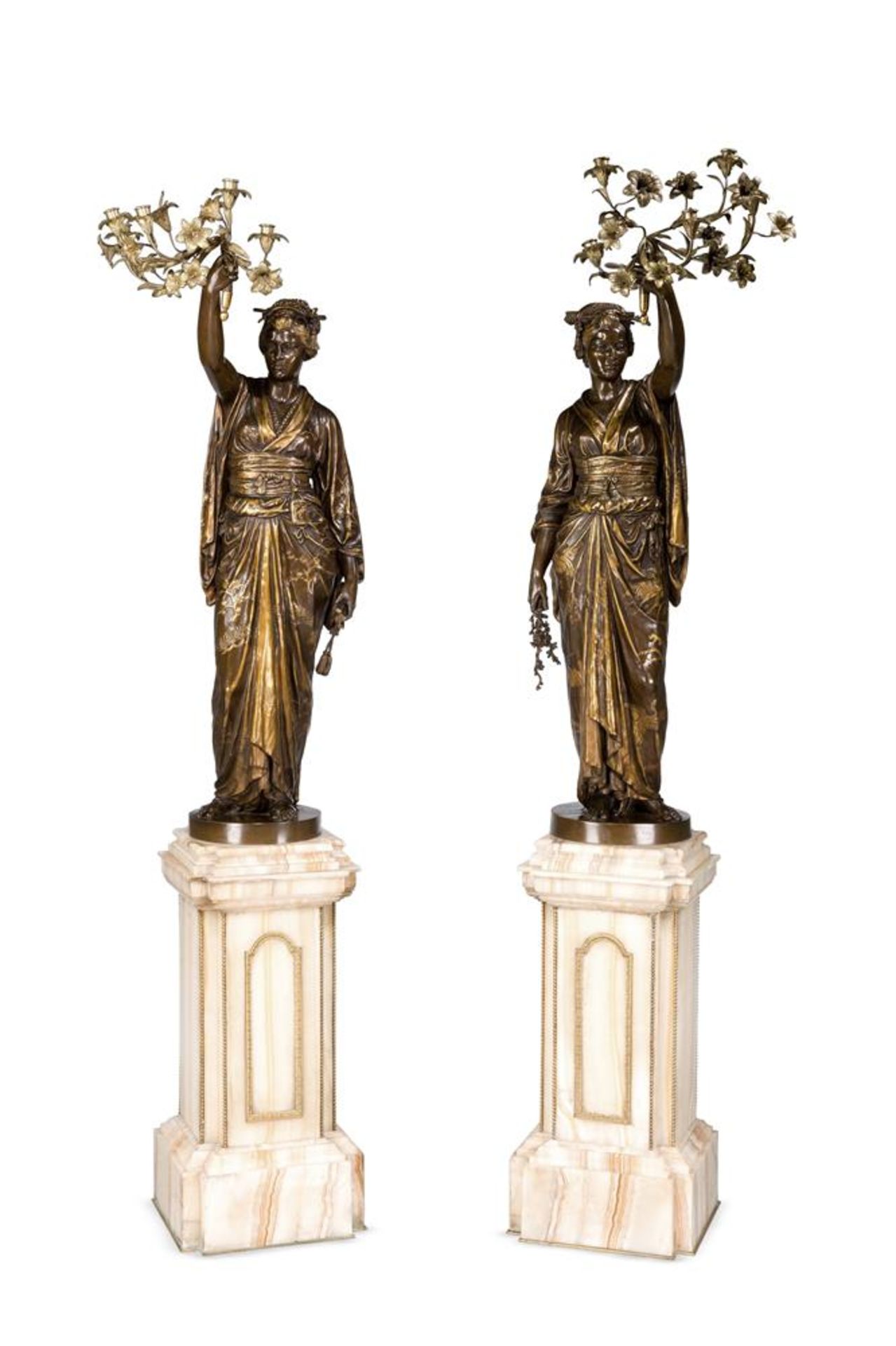 A RARE PAIR OF PARCEL GILT AND BRONZE FIGURAL TORCHERES, BY BARBEDIENNE AND GUILLEMIN, CIRCA 1870