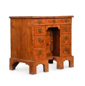 A GEORGE II ASH KNEEHOLE DESK, MID 18TH CENTURY