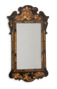 A BLACK LACQUER AND GILT JAPANNED WALL MIRROR, IN GEORGE II STYLE, 19TH CENTURY
