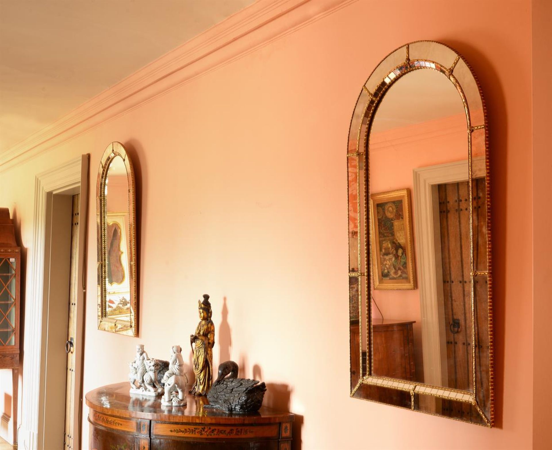 A PAIR OF GILT METAL MOUNTED MIRRORS, IN VENETIAN STYLE, 20TH CENTURY