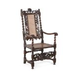 A CHARLES II CARVED WALNUT ARMCHAIR, CIRCA 1680