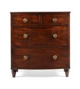 A GEORGE III MAHOGANY BOWFRONT CHEST OF DRAWERS, CIRCA 1810