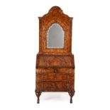 A NORTH ITALIAN FIGURED WALNUT AND CROSSBANDED BUREAU CABINET, MID 18TH CENTURY