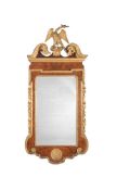 A WALNUT AND PARCEL GILT WALL MIRROR, IN GEORGE II STYLE, 20TH CENTURY