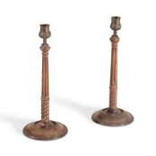 A PAIR OF GEORGE III MAHOGANY AND BRASS CANDLESTICKS, PROBABLY SCOTTISH, CIRCA 1800