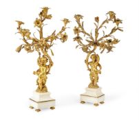 A PAIR OF FRENCH ORMOLU AND WHITE MARBLE FIVE-LIGHT CANDELABRA, 19TH CENTURY
