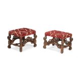 A PAIR OF CARVED WALNUT STOOLS, IN 17TH CENTURY CAROLEAN STYLE