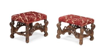 A PAIR OF CARVED WALNUT STOOLS, IN 17TH CENTURY CAROLEAN STYLE