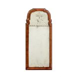 A QUEEN ANNE WALNUT WALL MIRROR, CIRCA 1710