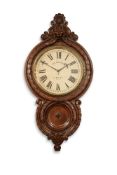 A SUBSTANTIAL VICTORIAN CARVED MAHOGANY WALL TIMEPIECE, THIRD QUARTER OF THE 19TH CENTURY