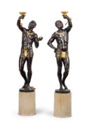 A RARE PAIR OF POLYCHROME CAST IRON BLACKAMOOR FIGURES, MID 19TH CENTURY