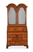 A QUEEN ANNE WALNUT DOUBLE-DOMED BUREAU CABINET, EARLY 18TH CENTURY AND LATER