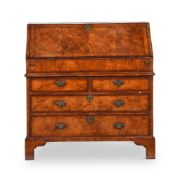 A QUEEN ANNE WALNUT BUREAU, EARLY 18TH CENTURY