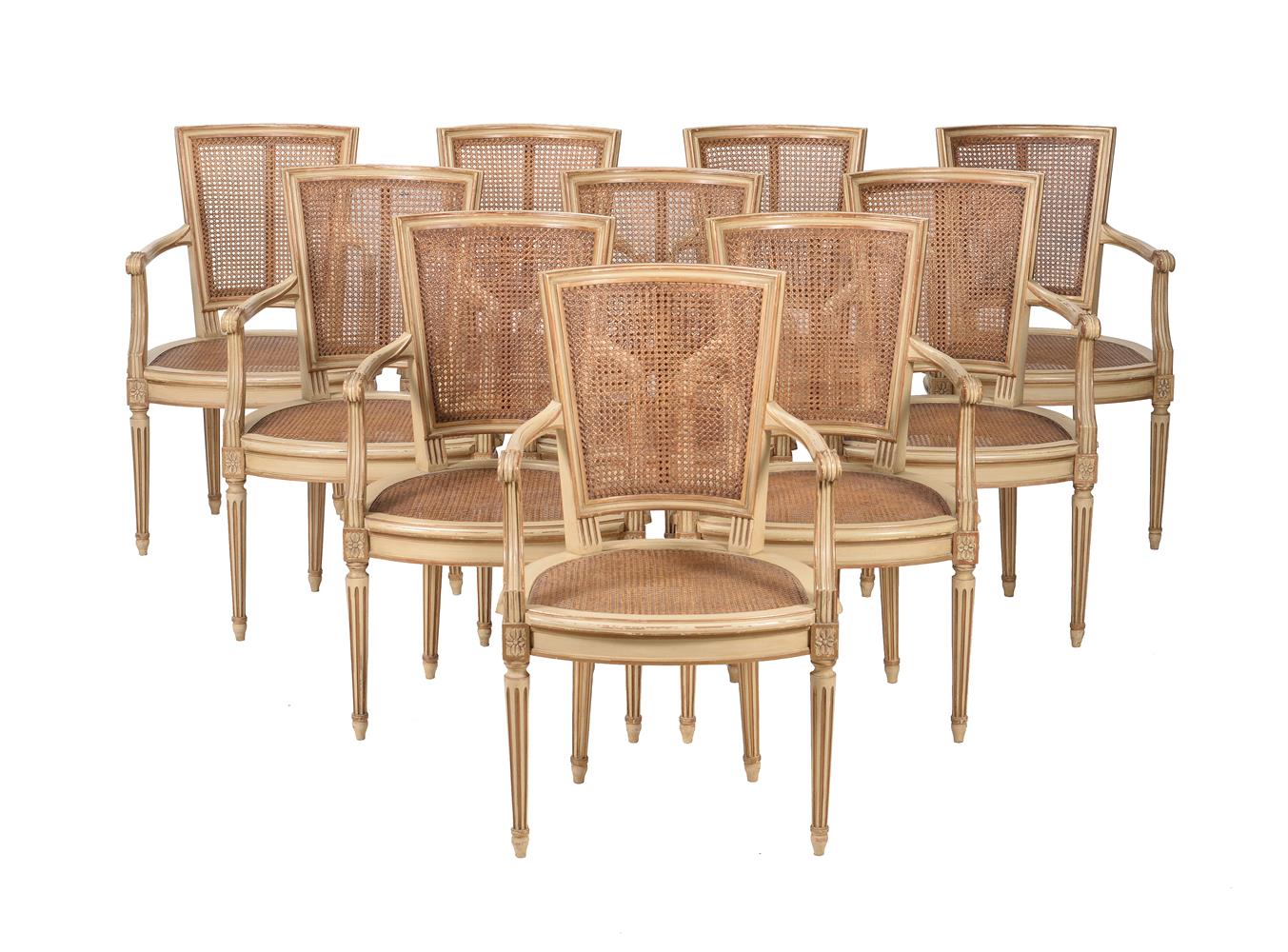 A SET OF TEN PAINTED WOOD DINING CHAIRS IN FRENCH TRANSITIONAL STYLE